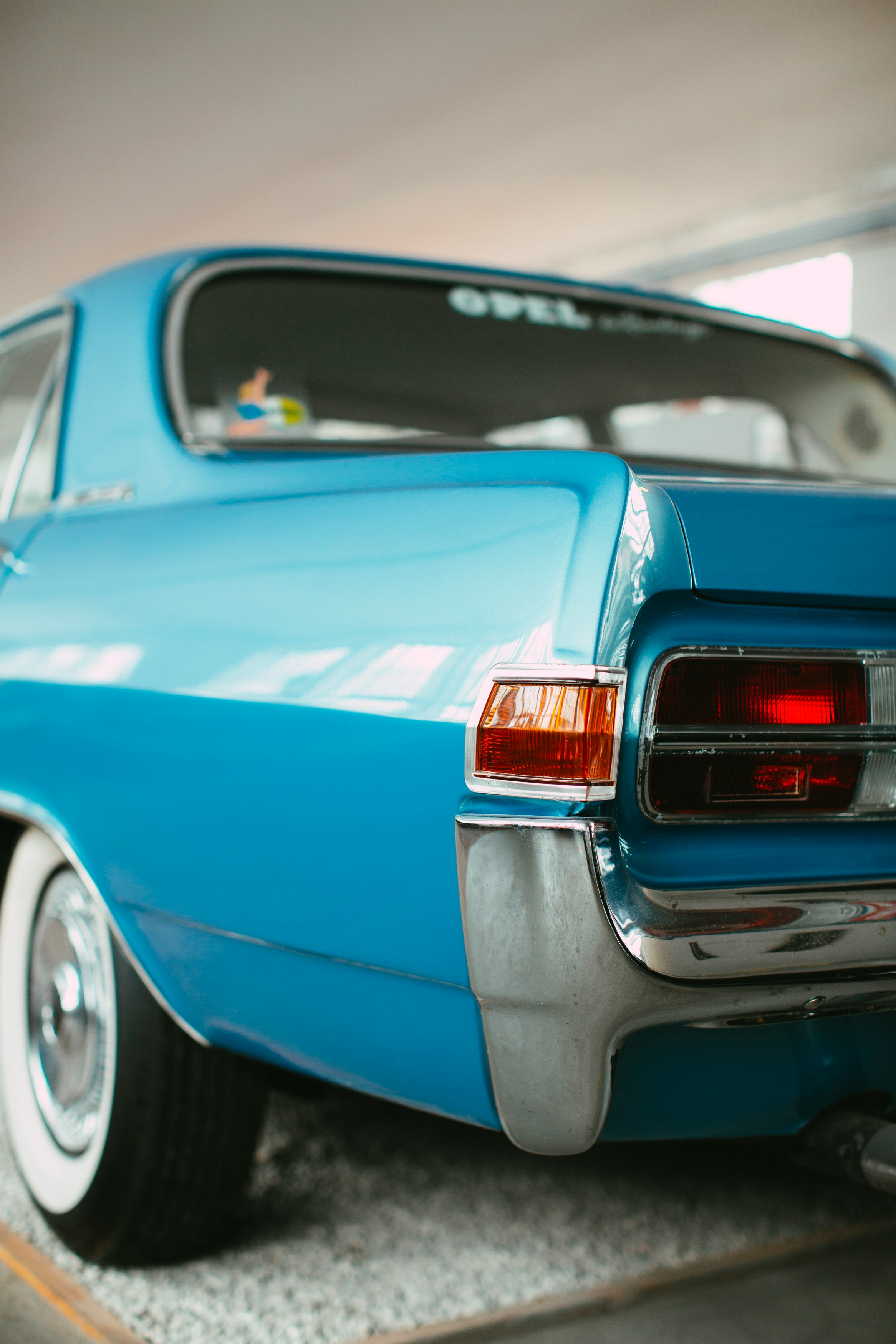 blue chevrolet camaro in close up photography